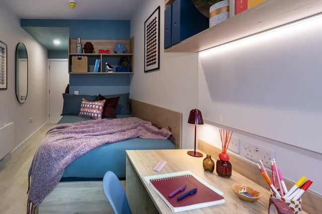 Bed desk lamp and study supplies bedroom at Queen Street Place in Galway Student Accommodation