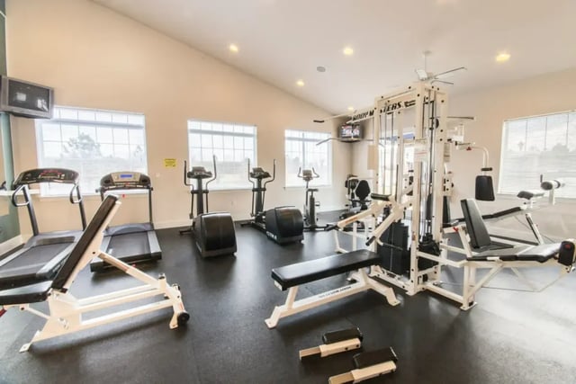 Treadmills ellipticals multi gym weights gym room at Belmont Landing in Farmville Student Accommodation