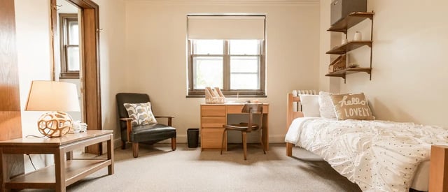 Bed desk chair and lamp bedroom at 5748 Blackstone by 3L Living in Chicago Student Accommodation