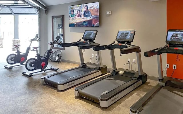 Treadmills exercise bikes and fan gym at Cedar Pointe Apartments in Blacksburg Student Accommodation