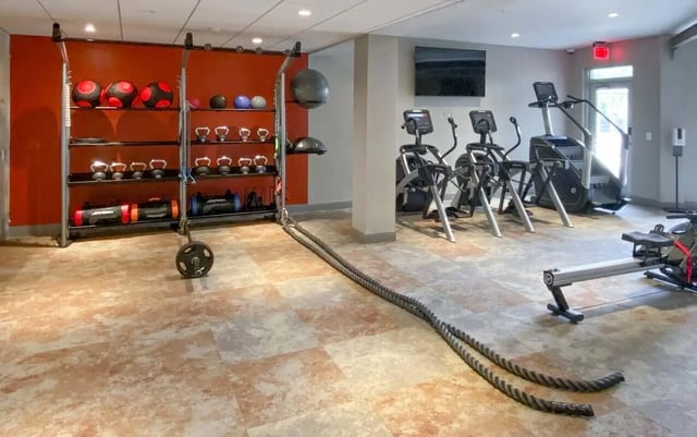 Weights machines ropes and exercise balls gym at Cedar Pointe Apartments in Blacksburg Student Accommodation