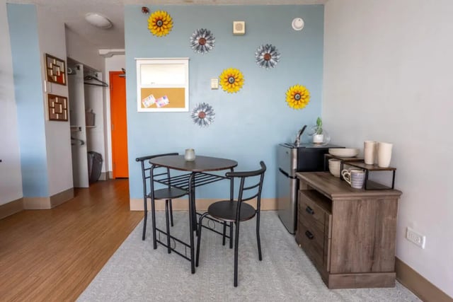 Small dining set mini fridge storage cabinet Kitchen at Assembly Student Living in Denver Student Accommodation