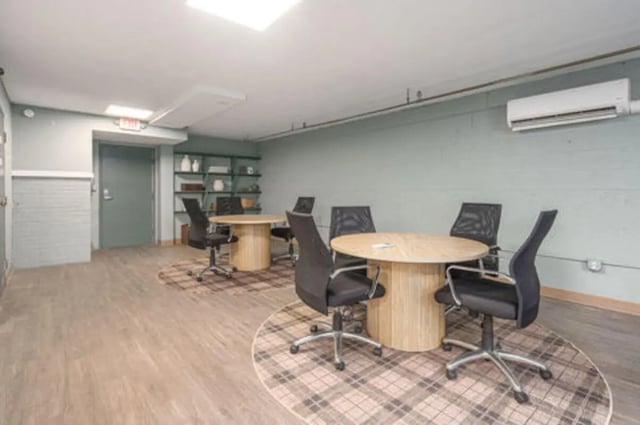 Round tables with black chairs study area at Cedar Street Apartments in East Lansing Student Accommodation