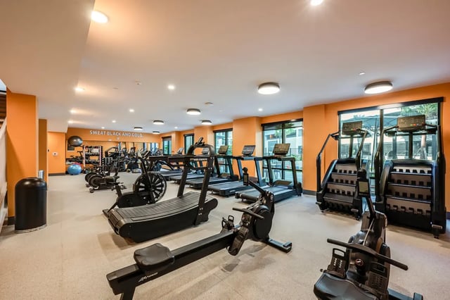 Treadmills rowers stair climbers gym fitness area at Aperture in Orlando Student Accommodation