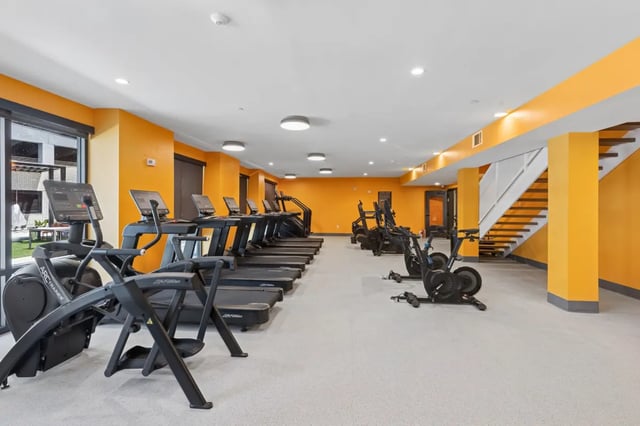 Treadmills elliptical bikes stairs gym at Aperture in Orlando Student Accommodation