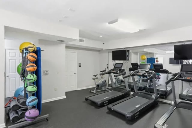 Treadmills exercise bikes medicine balls gym equipment gym at Legacy Student Living in Tallahassee Student Accommodation