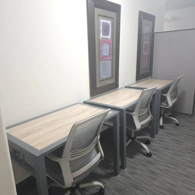 Row of desks and chairs study area at Pinnacle Point Apartments in Rexburg Student Accommodation