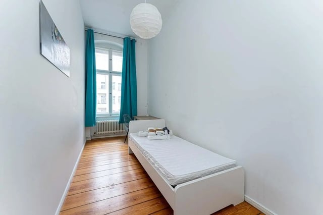 White bed desk and artwork bedroom at Kaiser-Friedrich-Straße - Room 4 in Berlin Student Accommodation