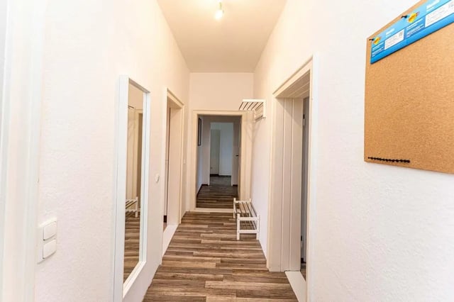 Corkboard with notices on wall hallway hall at Sterndamm 83.4 in Berlin Student Accommodation