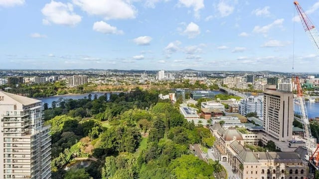 Apartment buildings and river in cityscape exterior at UniLodge Brisbane City in Brisbane Student Accommodation
