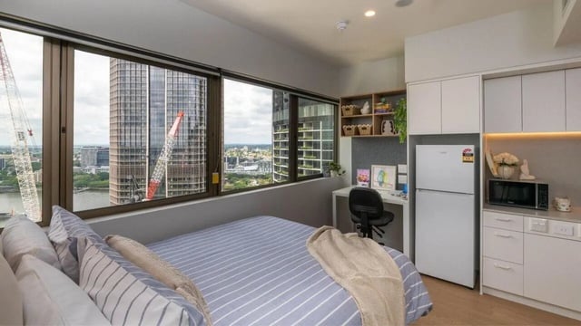 Bed desk fridge microwave kitchen bedroom study area at UniLodge Brisbane City in Brisbane Student Accommodation