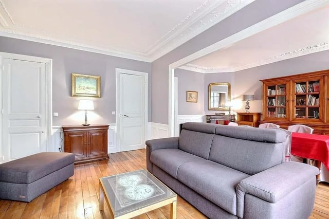 Sofa ottoman coffee table cabinet living room at Apartment in Rue Damrémont, 75018 Paris, France in Paris Student Accommodation