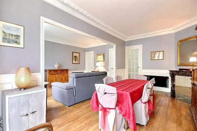 Dining table sofa fireplace living room at Apartment in Rue Damrémont, 75018 Paris, France in Paris Student Accommodation