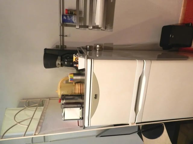 Small refrigerator coffee maker kitchen items kitchen at Studio in Rue de Dantzig, 75015 Paris, France in Paris Student Accommodation