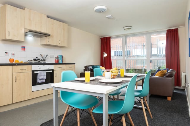 Kitchen with dining table and chairs living area at Albert Court in Liverpool Student Accommodation