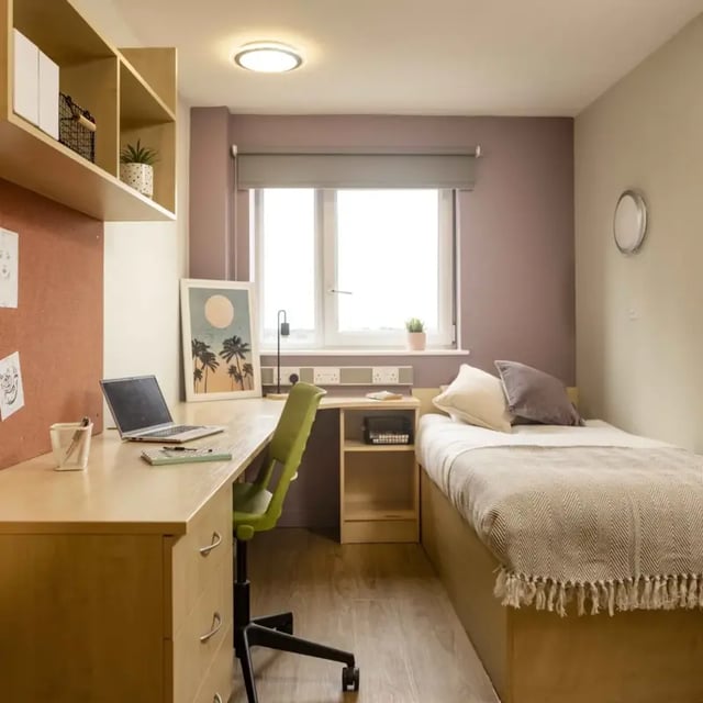 Desk laptop chair bed with blanket bedroom at Belgrave View in Birmingham Student Accommodation