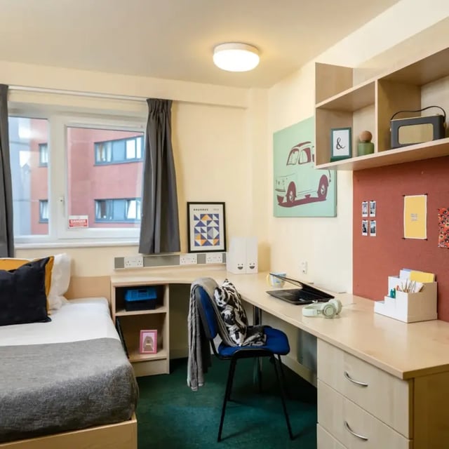 Bed desk chair and shelves student bedroom at Belgrave View in Birmingham Student Accommodation