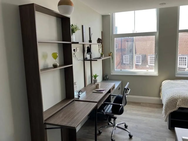 Desk bed shelving and hourglass student bedroom at Pavilion Court London in Wembley Student Accommodation
