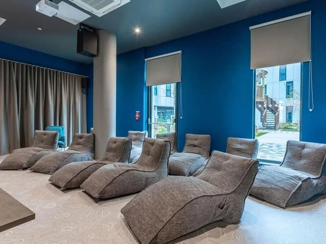 Beanbag chairs and projector in lounge area at Pavilion Court London in Wembley Student Accommodation