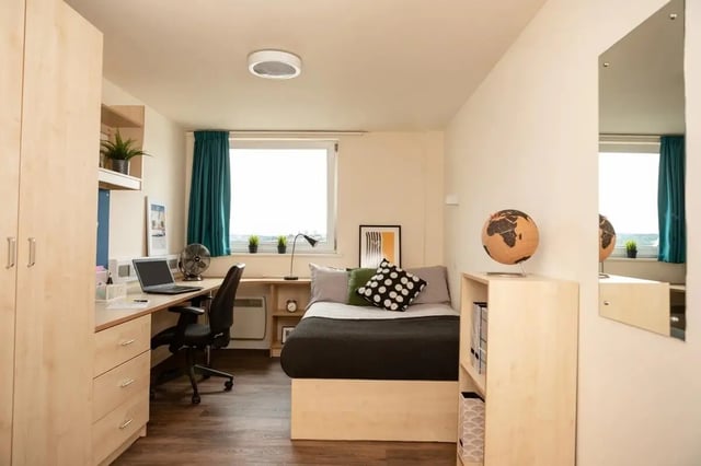 Bed desk and closet student bedroom at Burley Road in Leeds Student Accommodation