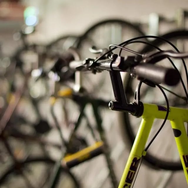 Bicycles parked in rack communal area exterior at Burley Road in Leeds Student Accommodation