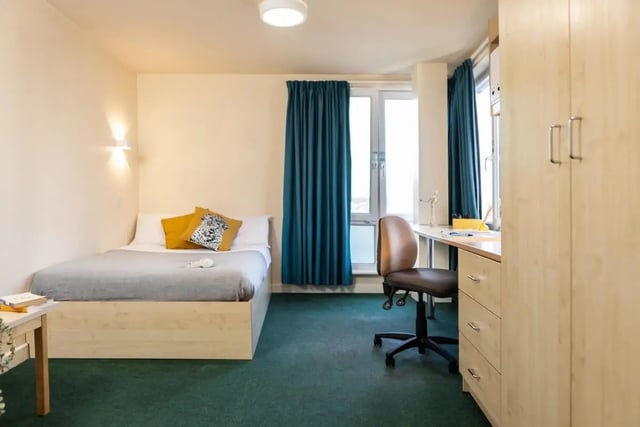 Bed desk chair wardrobe bedroom study area at Burley Road in Leeds Student Accommodation