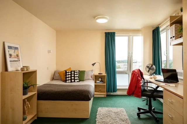 Bed desk chair laptop window bedroom at Burley Road in Leeds Student Accommodation