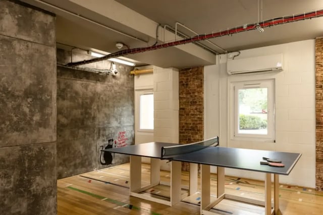Ping pong table with racquets playing area at Mcmillan student Village in Greenwich Student Accommodation