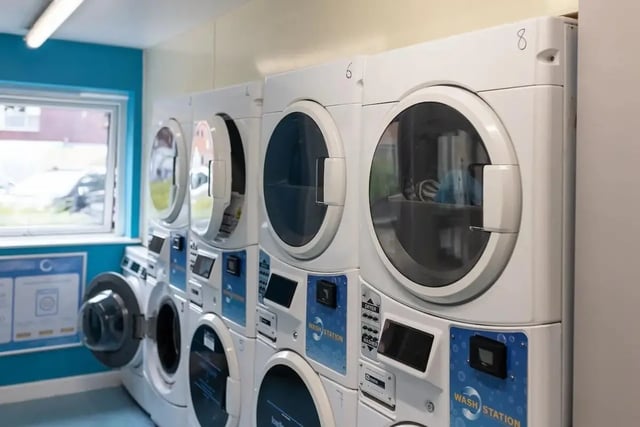 Row of stacked washing machines and dryers Laundry room at Bonington Student Village in Loughborough Student Accommodation