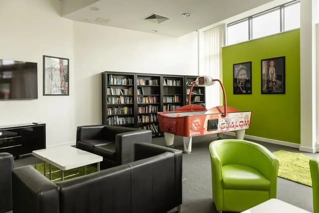 Air hockey table sofas bookshelves living room at Bonington Student Village in Loughborough Student Accommodation