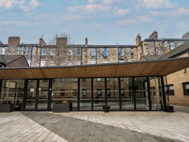 Glass entrance with large windows and wooden exterior. at Meadow Court in Edinburgh Student Accommodation