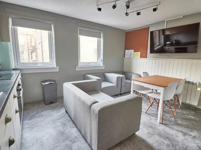 Sofa dining table and TV living room at Meadow Court in Edinburgh Student Accommodation