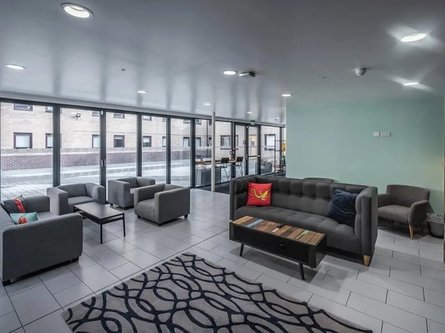 Sofas coffee table rug living room at Meadow Court in Edinburgh Student Accommodation