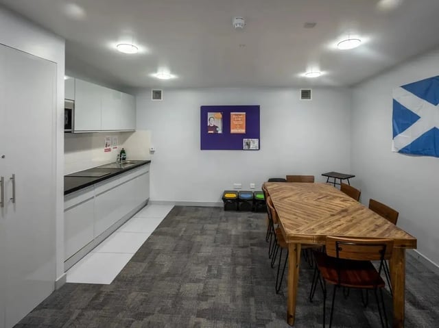 Kitchen with dining table communal area at Meadow Court in Edinburgh Student Accommodation
