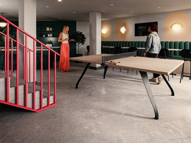 Ping pong table seating area and kitchen common area at Norton's Student Living in Edinburgh Student Accommodation