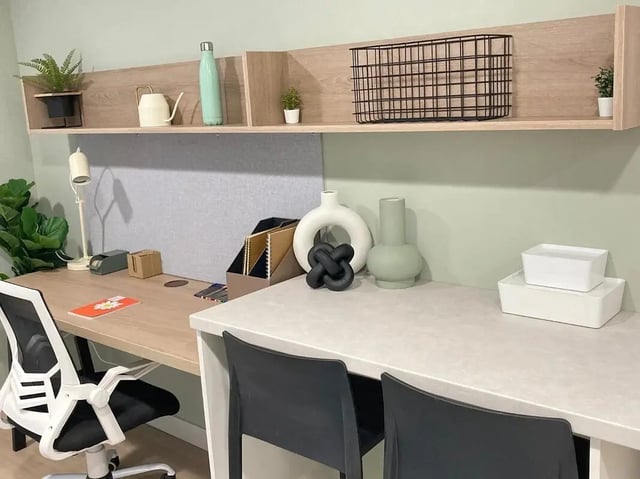 Desks with chairs and storage shelves Study area at Norton's Student Living in Edinburgh Student Accommodation