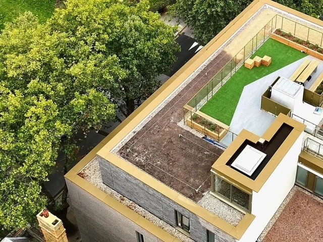 Rooftop garden with artificial grass and seating Exterior at View Studios in London Student Accommodation