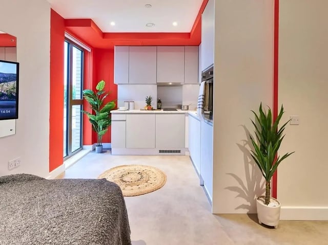 Modern kitchen with island and sofa kitchen at View Studios in London Student Accommodation