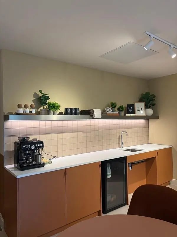 Espresso machine sink and mini fridge kitchen area at Valerian in York Student Accommodation