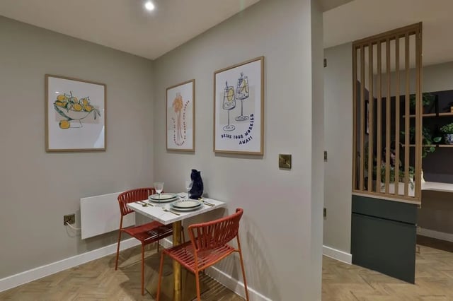 Two chairs table artwork heating dining area at London Road Apartments in Southampton Student Accommodation