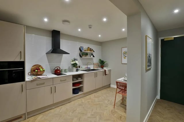 Modern kitchen with cabinets stove sink and dining area kitchen at London Road Apartments in Southampton Student Accommodation