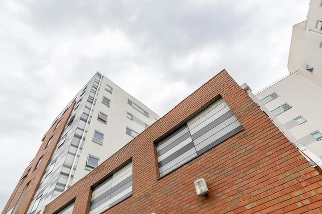 Brick and white building with modern windows exterior at Turner Court in Newcastle Upon Tyne Student Accommodation