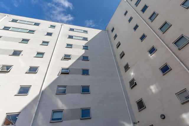 White building with many windows exterior at Turner Court in Newcastle Upon Tyne Student Accommodation