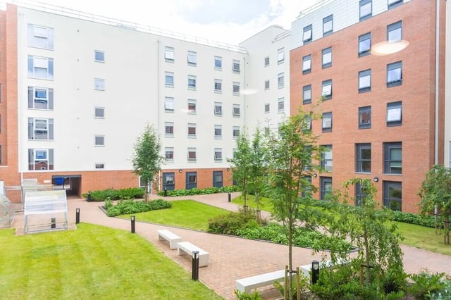 Courtyard with benches and trees exterior at Newton Court in Newcastle Upon Tyne Student Accommodation