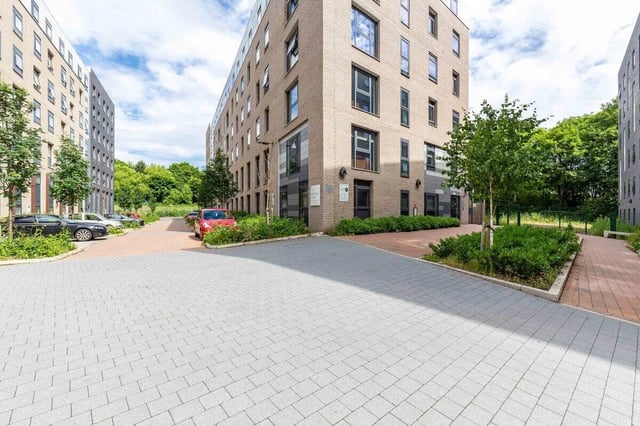 Apartment building cars green trees exterior at Marshall Court in Newcastle Upon Tyne Student Accommodation