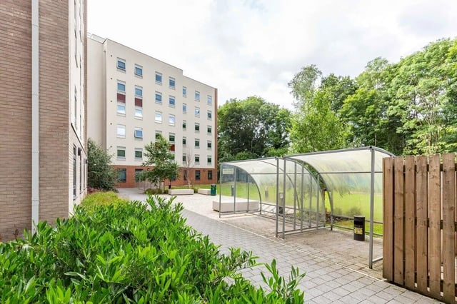 Apartment building bike shelter and trees exterior at Marshall Court in Newcastle Upon Tyne Student Accommodation