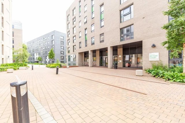 Modern brick buildings with paved courtyard exterior at Bryson Court in Newcastle Upon Tyne Student Accommodation