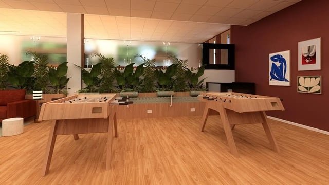 Two foosball tables and plants lounge area at St James Glasgow in Glasgow Student Accommodation