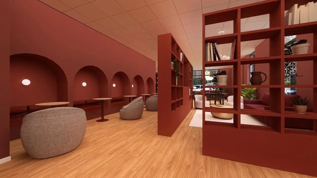 Arched booths round chairs tables bookshelf lounge area at St James Glasgow in Glasgow Student Accommodation