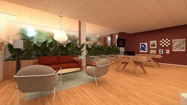 Red couch plants foosball tables living room at St James Glasgow in Glasgow Student Accommodation